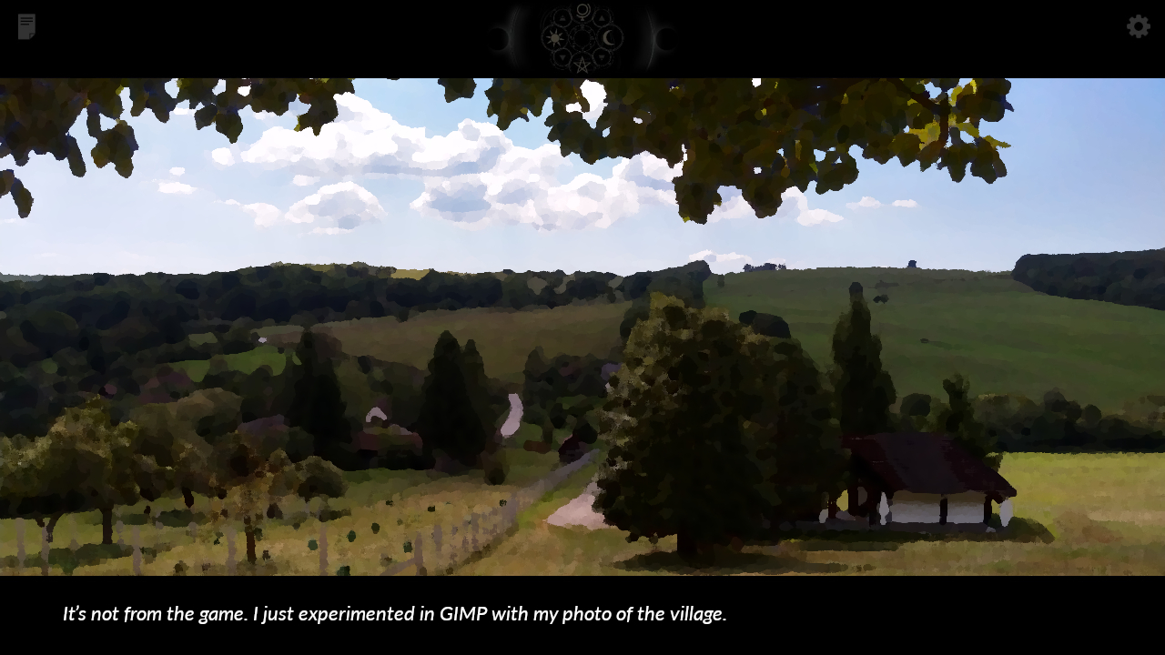 A landscape shot from a hilltop at the edge of a village. In the valley, you can see a vineyard, a winding road, and green fields in the background. In the foreground, there are a few trees and a small building. Tree branches partially cover the sky.